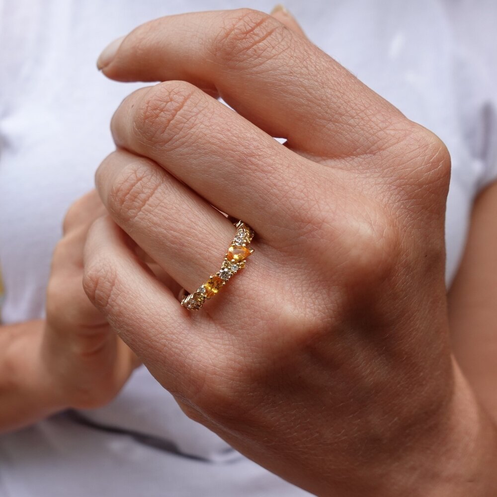 bert-jewellery-wedding-rings-coral-hand-model.jpg