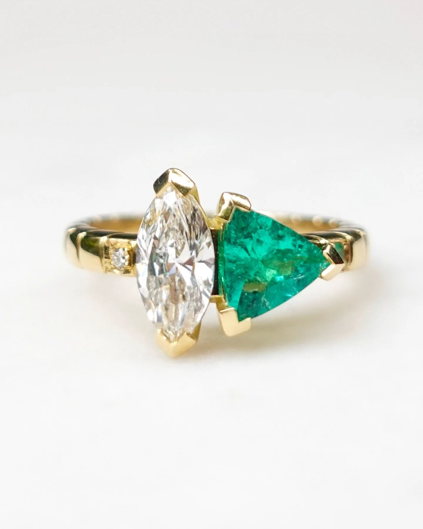 Wow. I loved making this ring. 
Gareth reached out to me knowing that I’d made a beautiful ring for his sister previously. His wife had admired that, so he asked me if I could make her a ring as a gift for her 40th birthday. She loved the emer