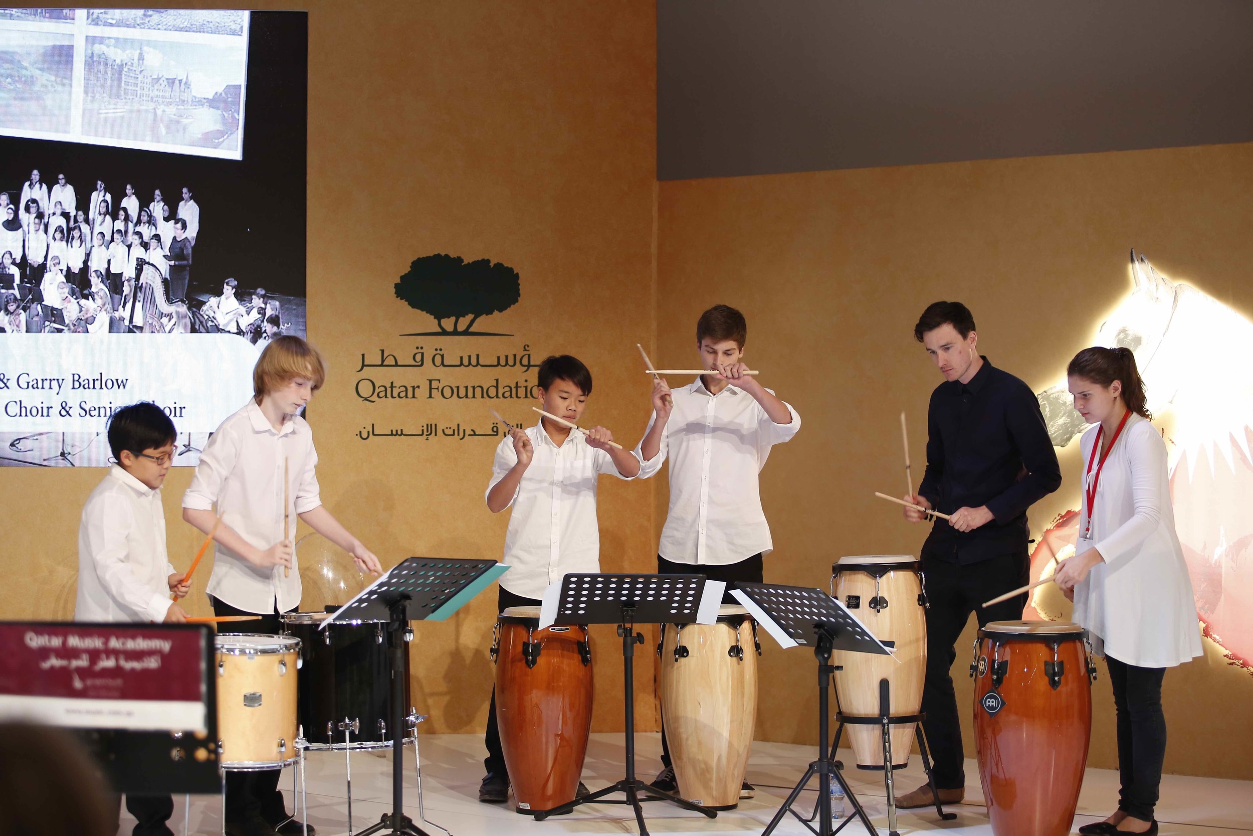 Performing with the Qatar Music Academy's Senior Percussion Ensemble