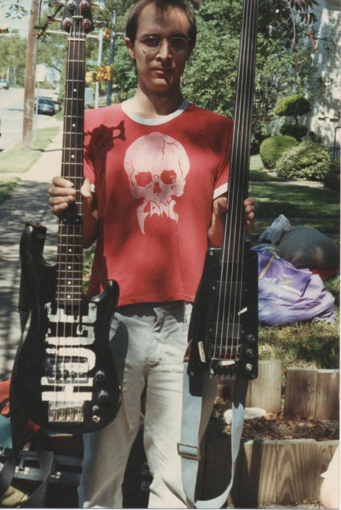 That's the Ibanez rb820 on the left. I wrote on it with white out.