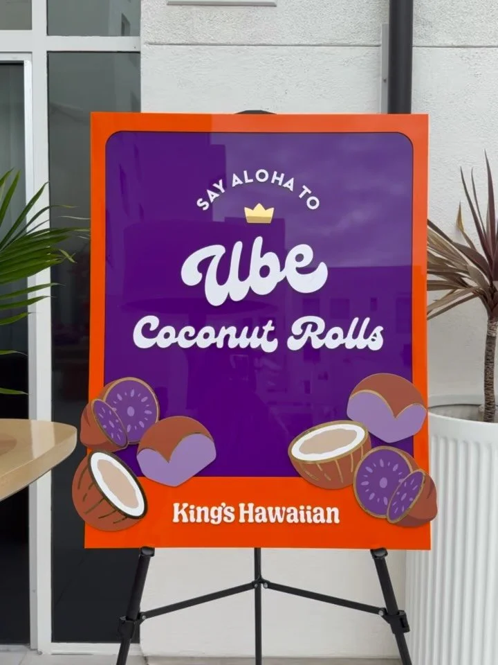 ube coconut rolls just entered the chat. 💜🧡🥥🤍

had the honor of bringing the signage to life for this @kingshawaiian moment, with the most beautiful florals by my girl @modflorals 🌺 and those little charms? uv printed to perfection by @lambs_gar