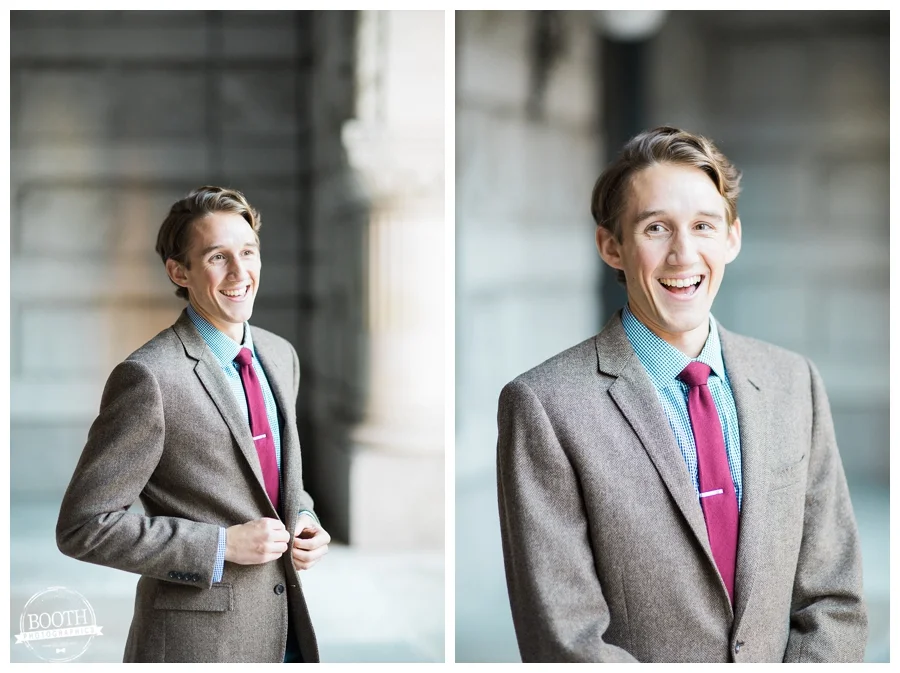 man in tweed suitcoat laughing on the Federal Courthouse building in Milwaukee Wisconsin