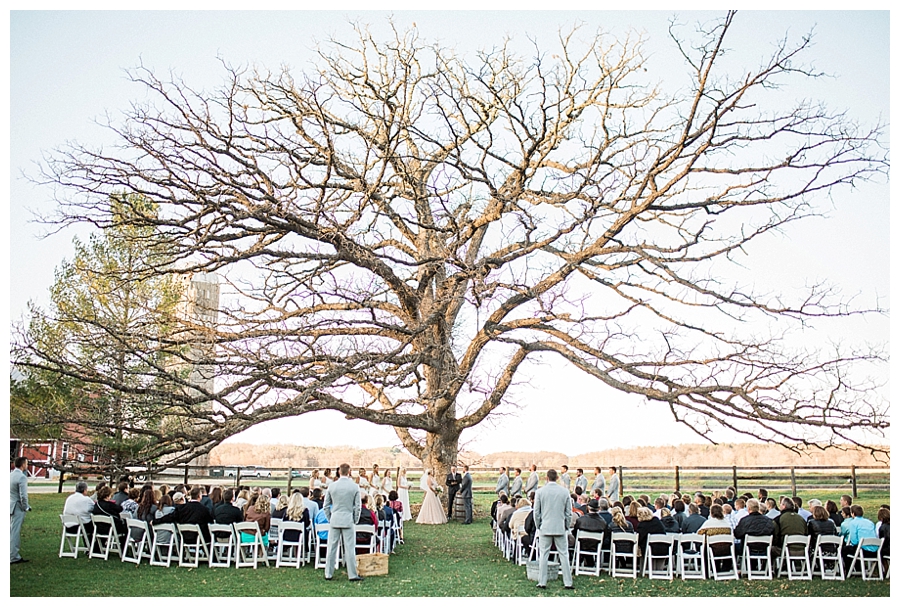a rustic outdoor fall wedding ceremony at Sugarland Barn
