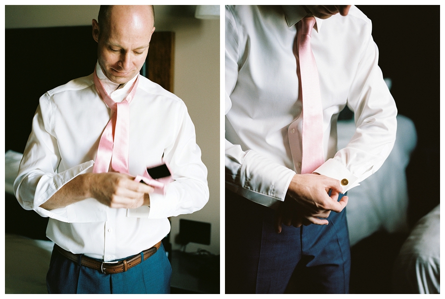 fine art photography of groom getting ready