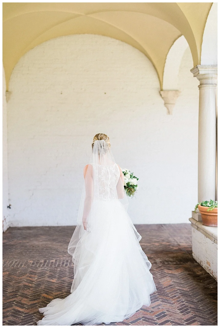 Bride and groom's first look at the Villa Terrace Museum of Decorative Arts