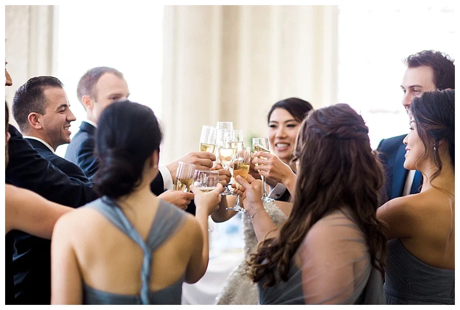 bridal party toasting before their wedding at the Madison Club
