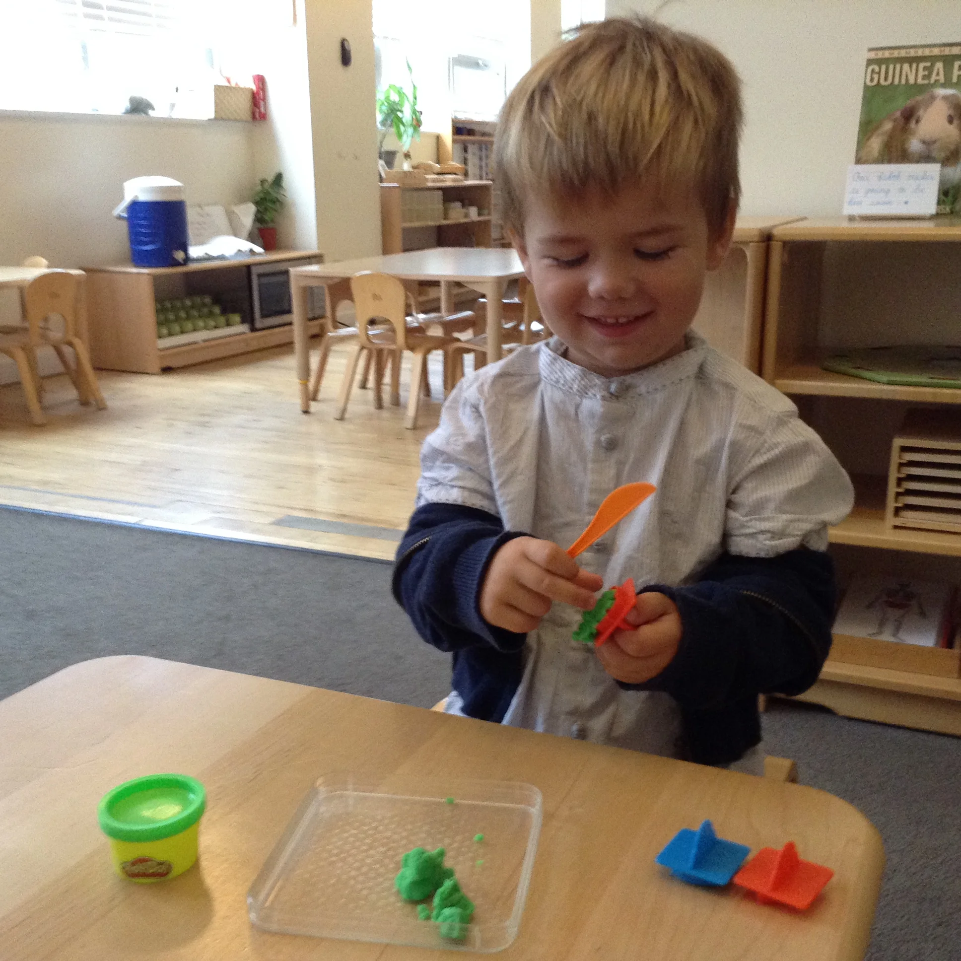 A friend enjoys exploring a particularly gooey work on his first day in the Green Room!