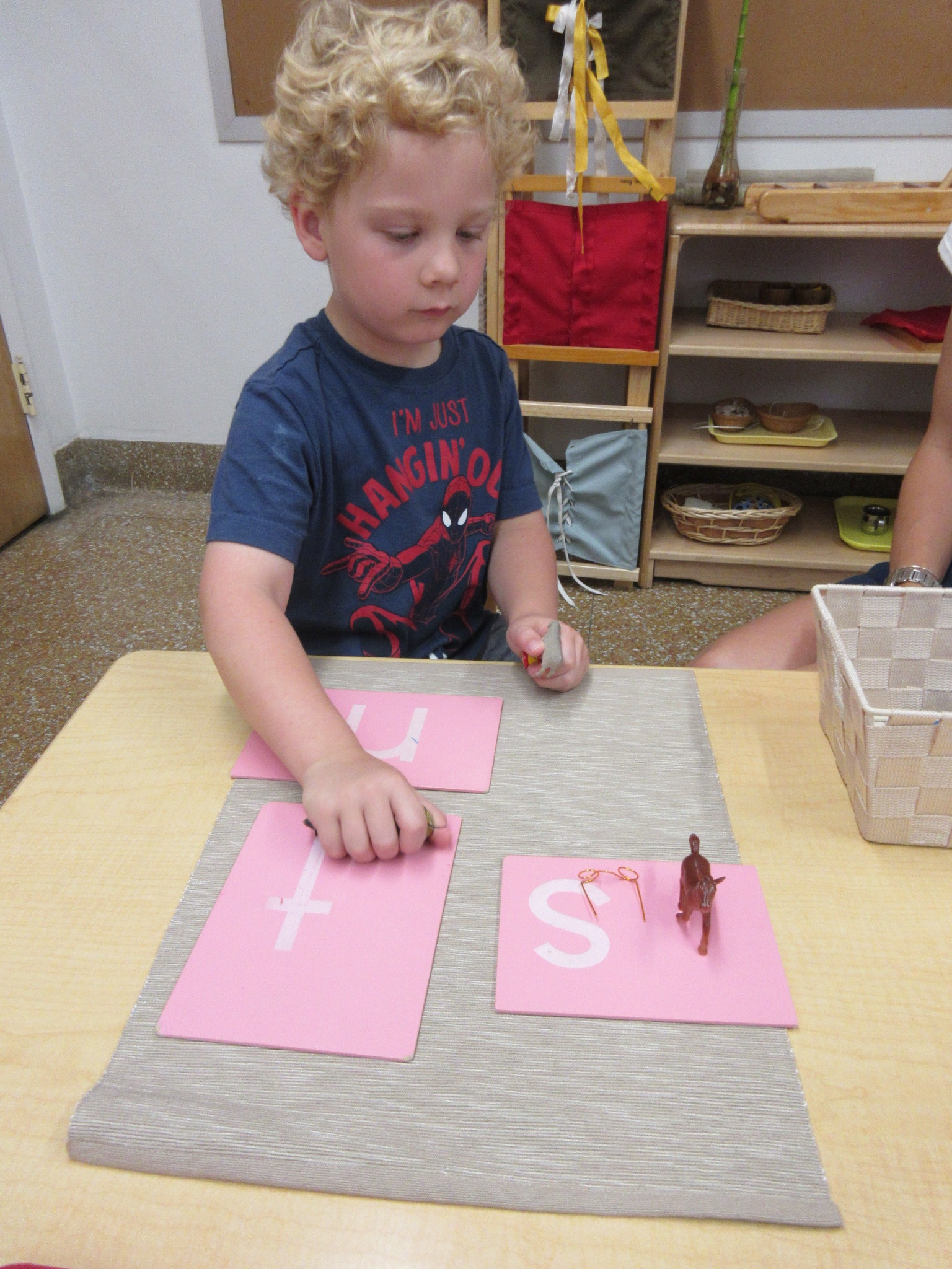 Practicing ending sounds with little objects.