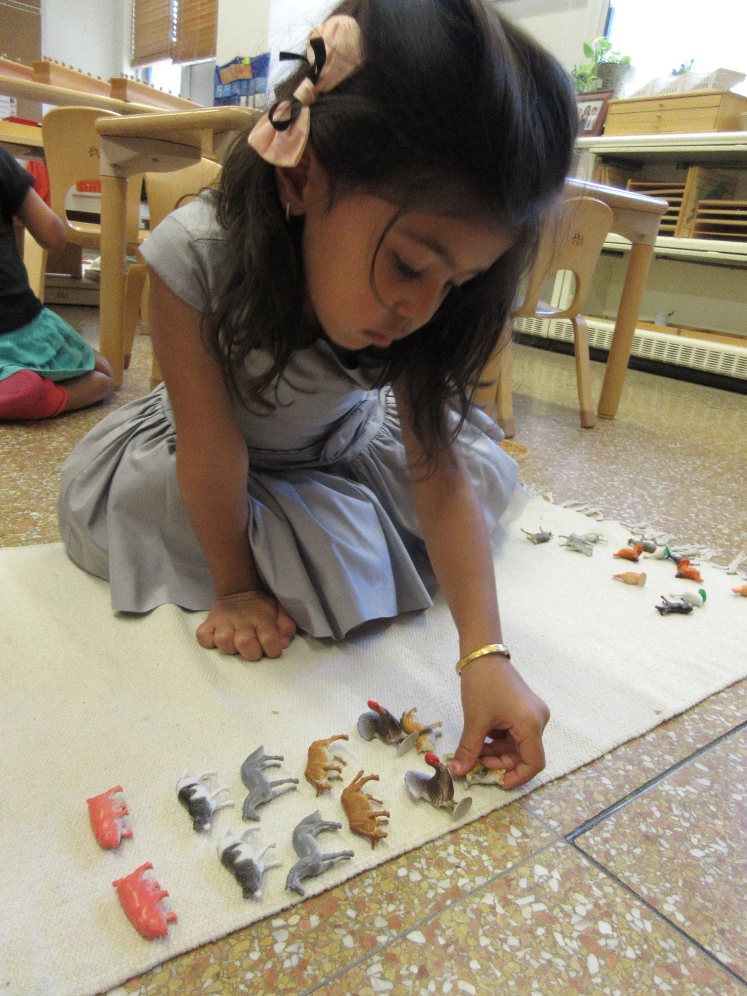 Learning the names of all the farm animals. I can't wait to see the live animals at the farm!