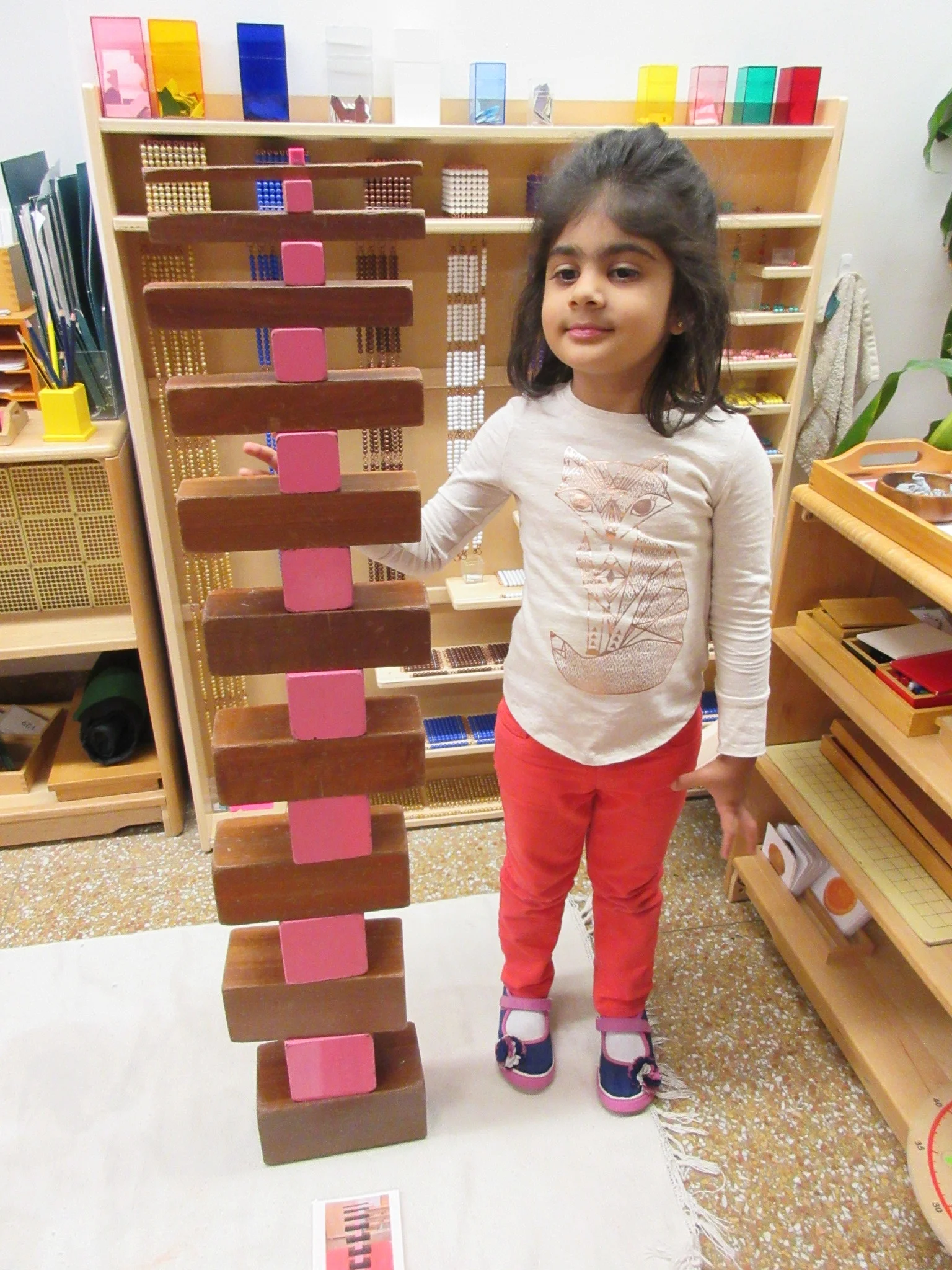 Look at this tall tower I can make with the Brown Prisms and Pink Cubes!