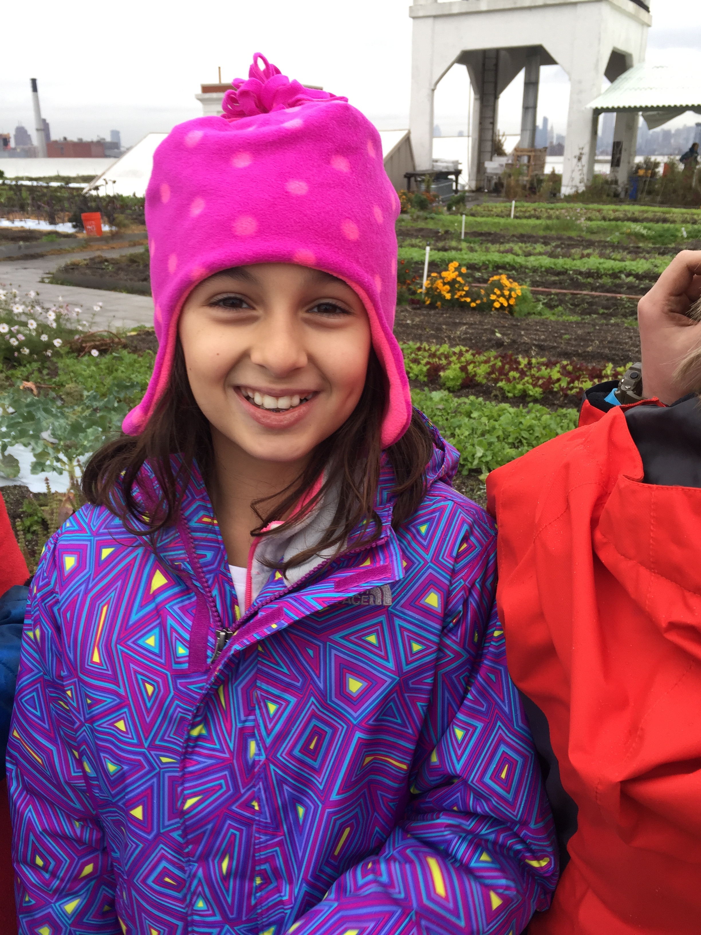 Upper Elementary student enjoying her city growers field trip  