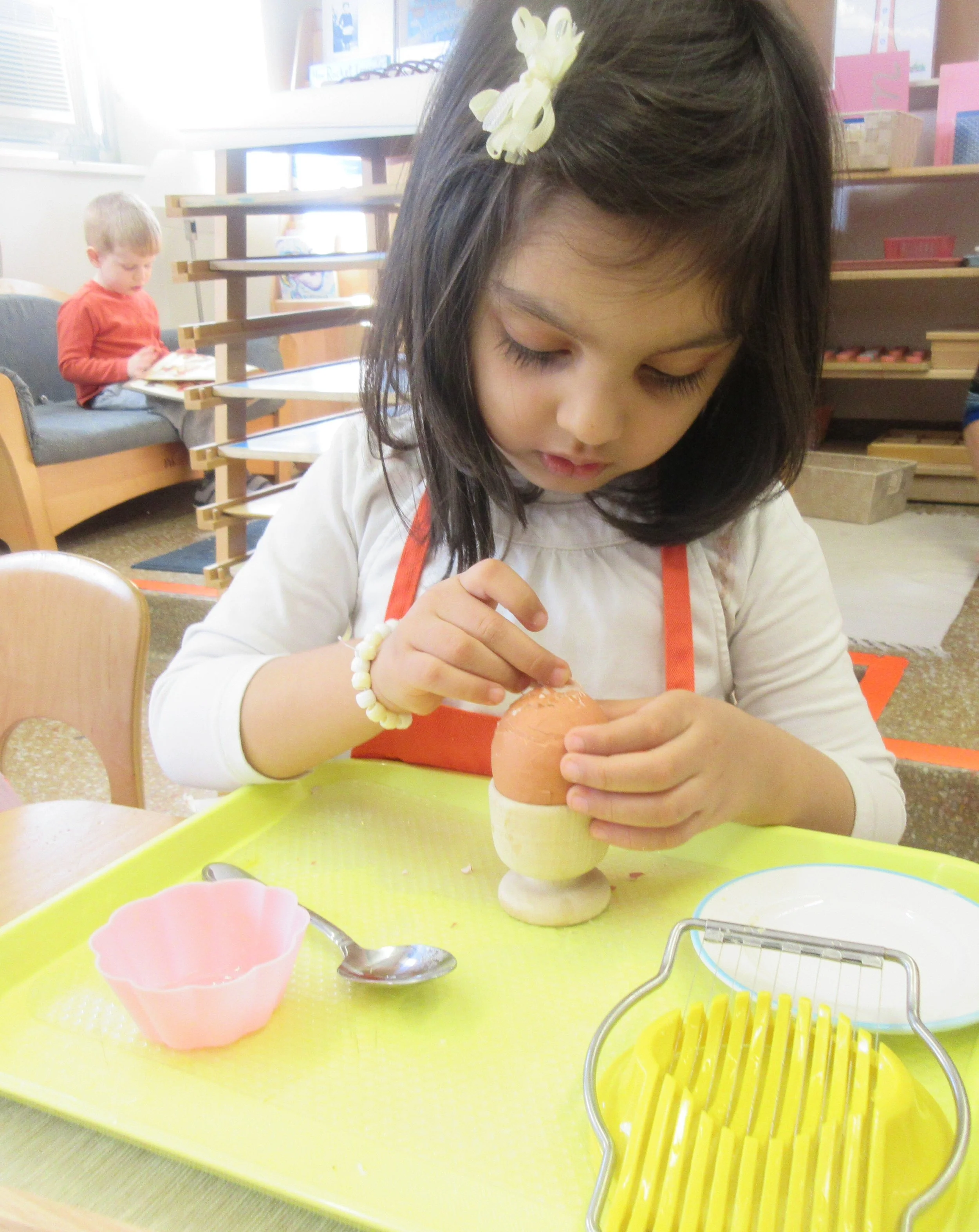 Making sure to remove every piece of eggshell before serving sliced eggs to classmates! 🍳