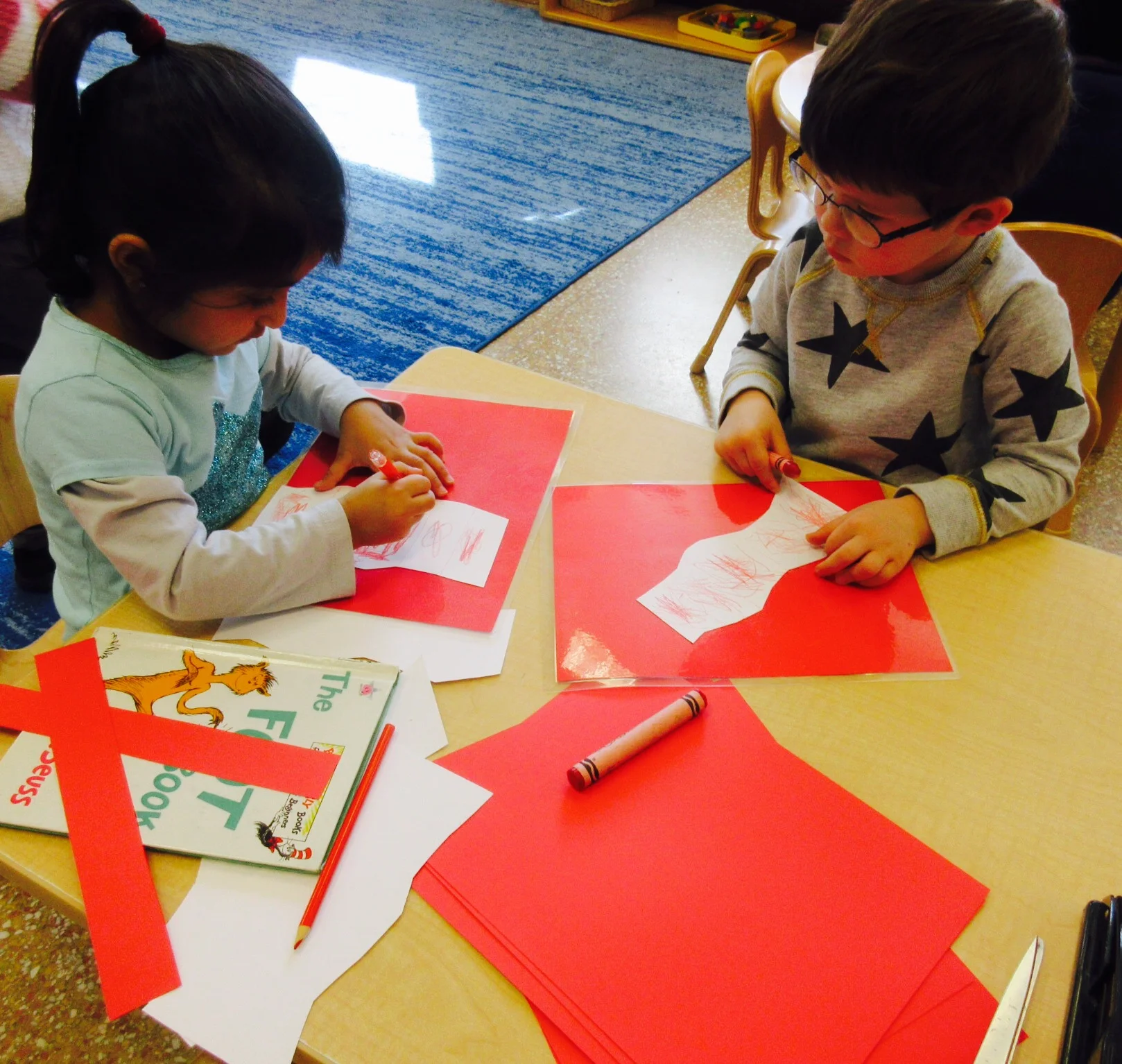 Celebrating Dr. Seuss birthday by making "Cat in the Hat" hats