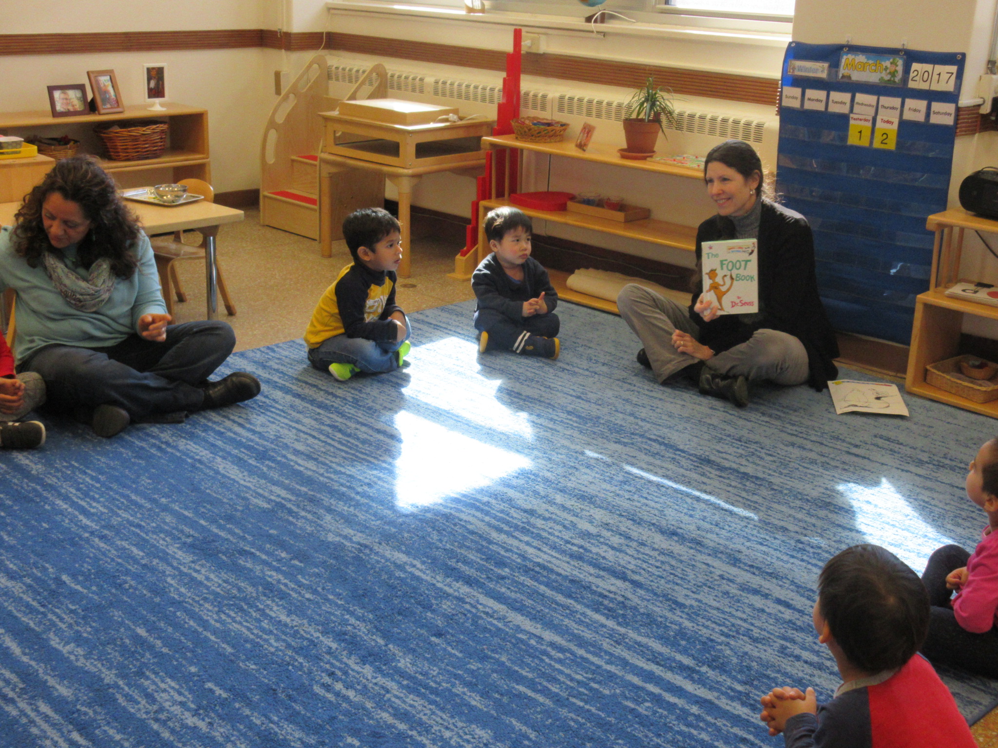 Reading "The Foot Book" by Dr. Seuss during circle time