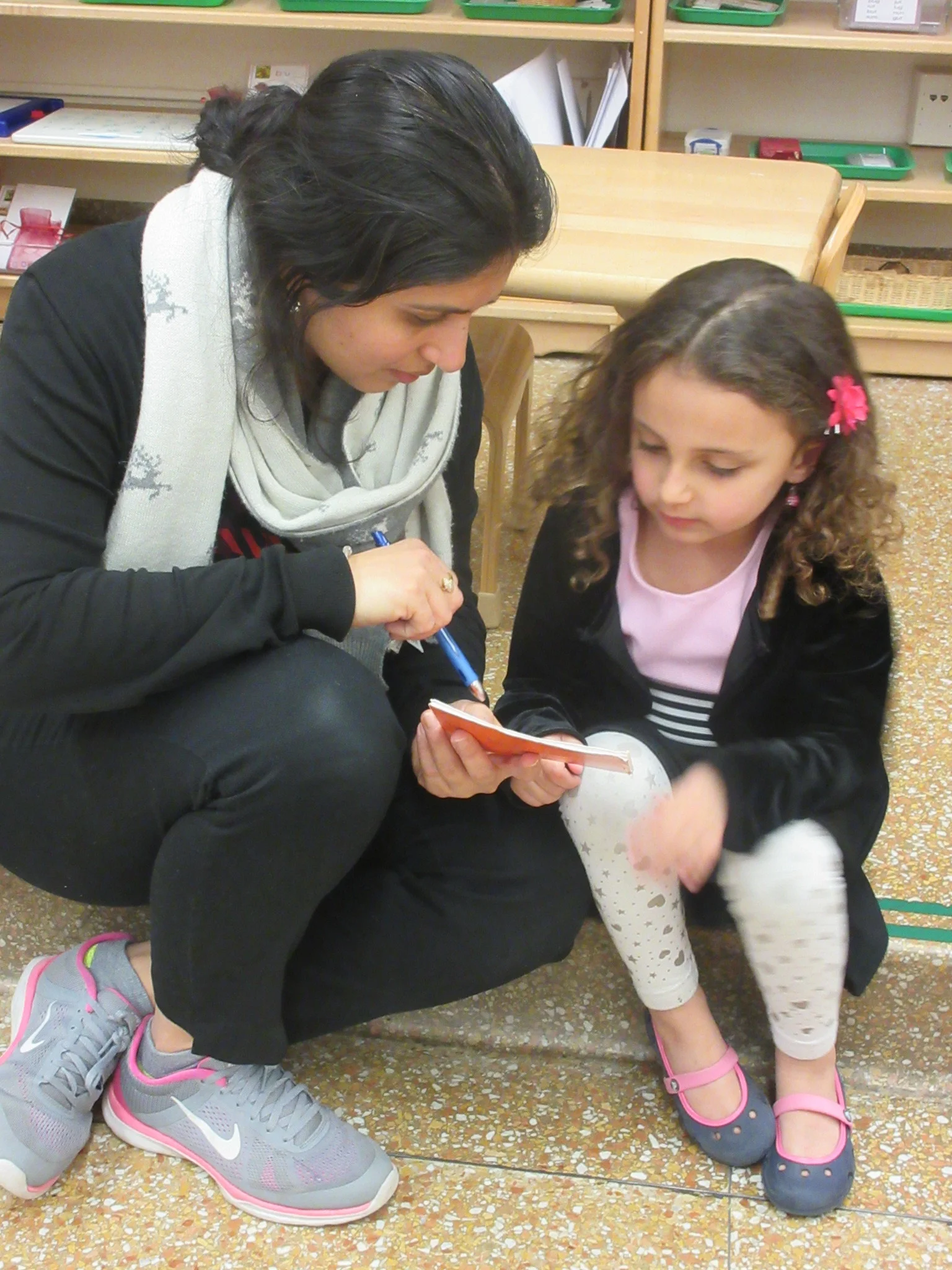 Practicing reading with Ms. Minal