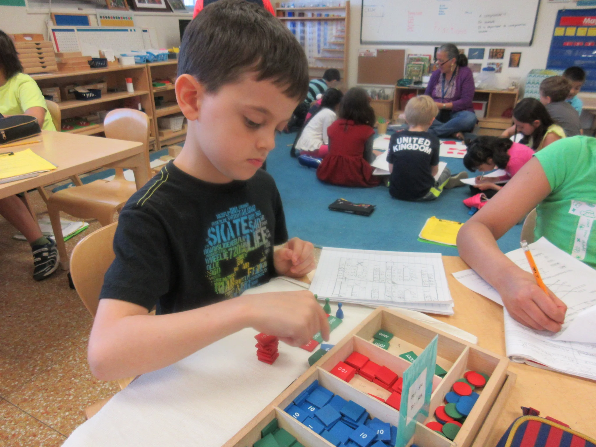 Division with the Stamp Game 