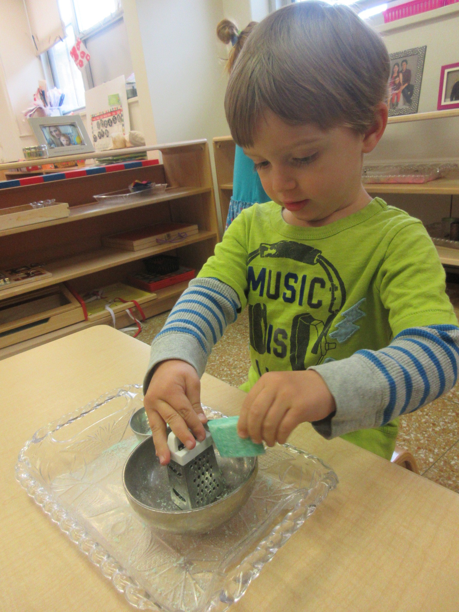 Using a grater to grate soap 