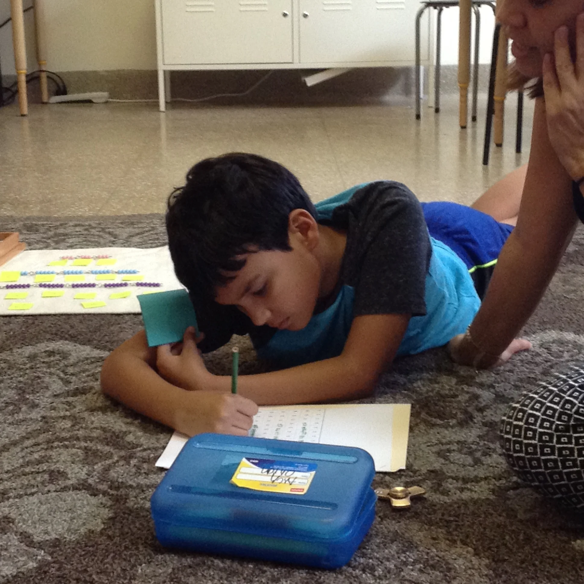 Filling out the Table of Multiples at our 4th level Math lesson.