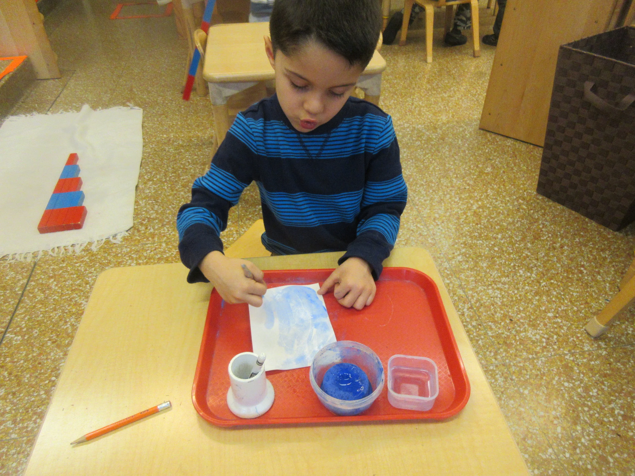 Making a snow storm with watercolor resist art!