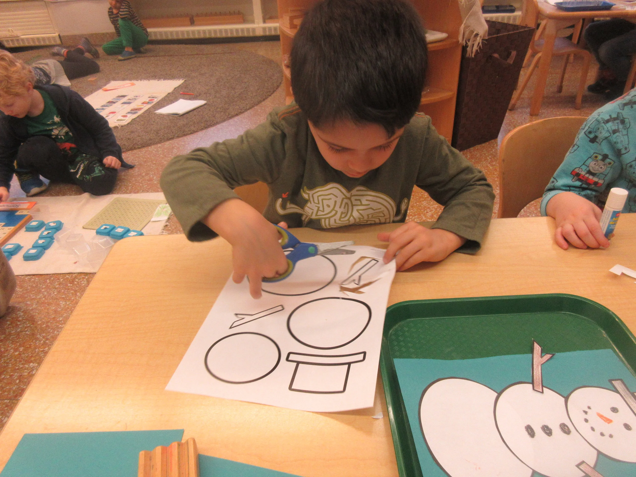 I can carefully cut to make a snowman.