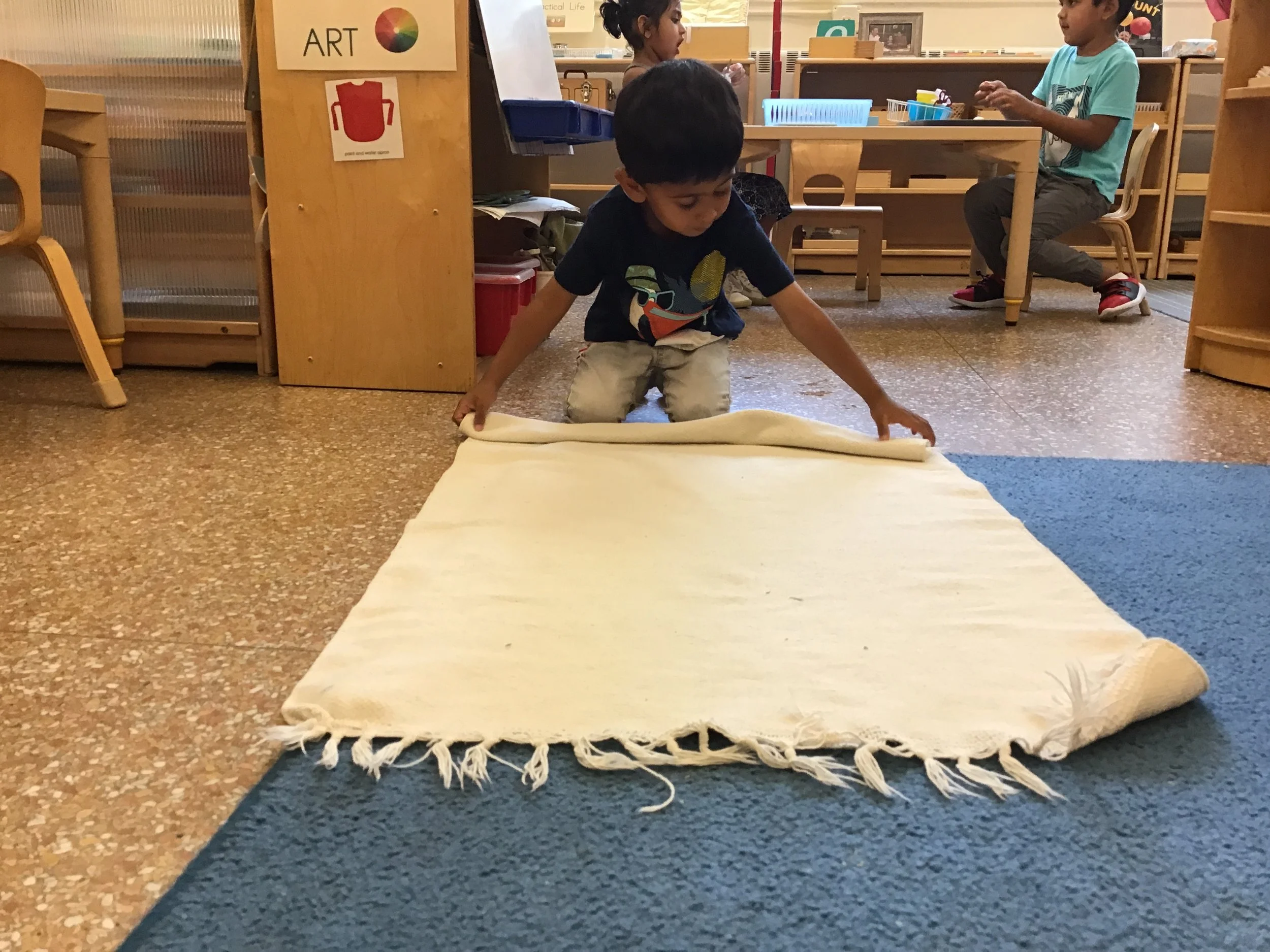 Rolling a rug very carefully 