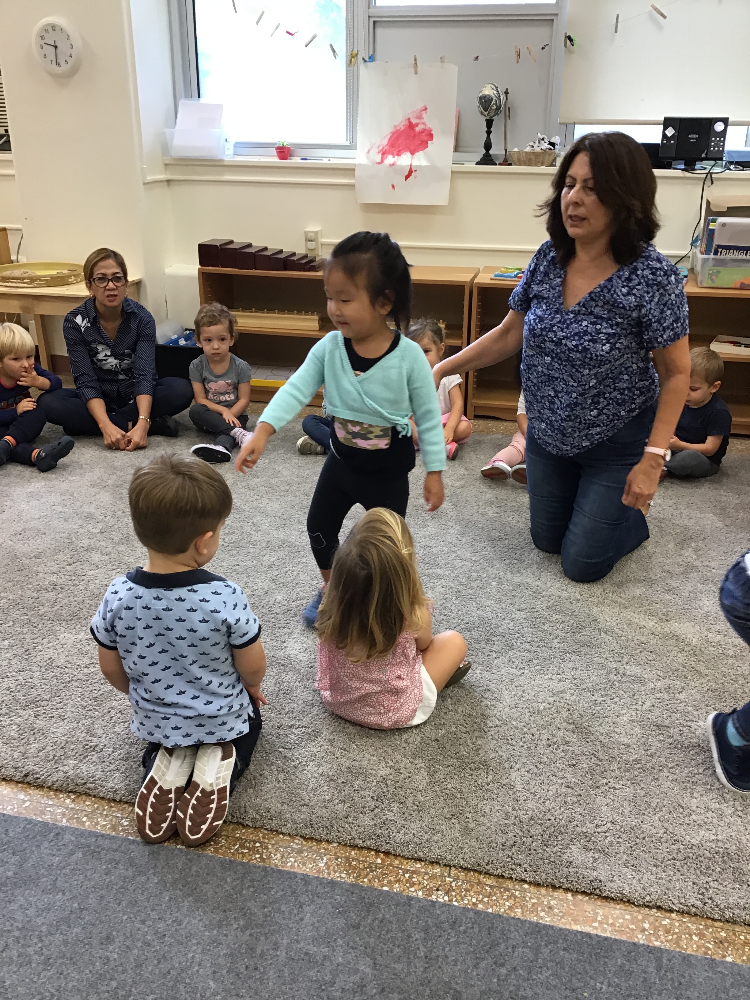 Counting friends during circle time.