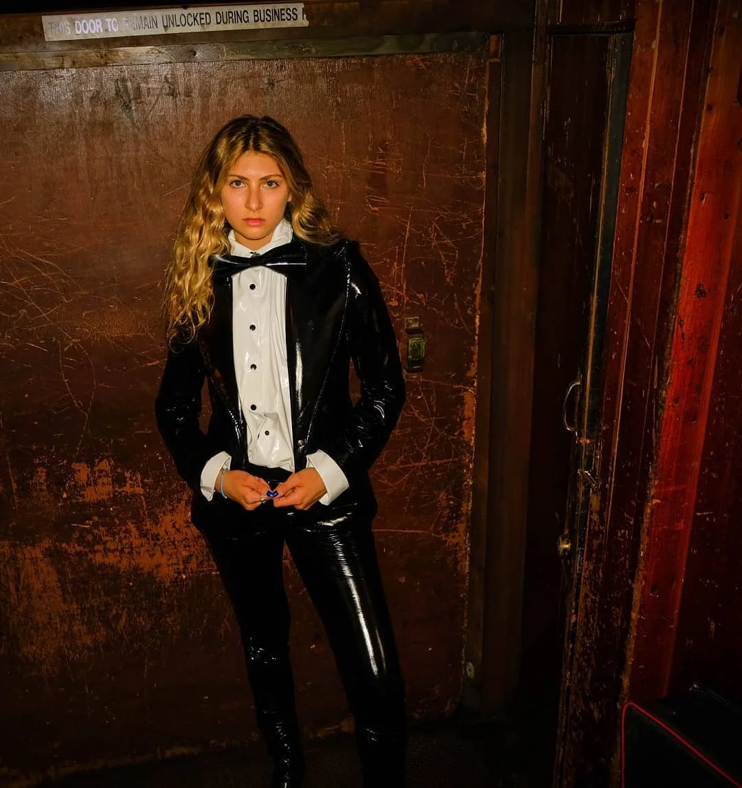 🐧 I look cute today in my vinyl tuxedo
.
Get yours here ➡️ www.fatalemaison.com
.
Styled and photographed by @georgiamtrpls worn by @bludetiger .
#steppingout #rockstyle #edgyfashion #rockstar #bassist #performer #tuxedo #vinyl #gohard #editorial #s