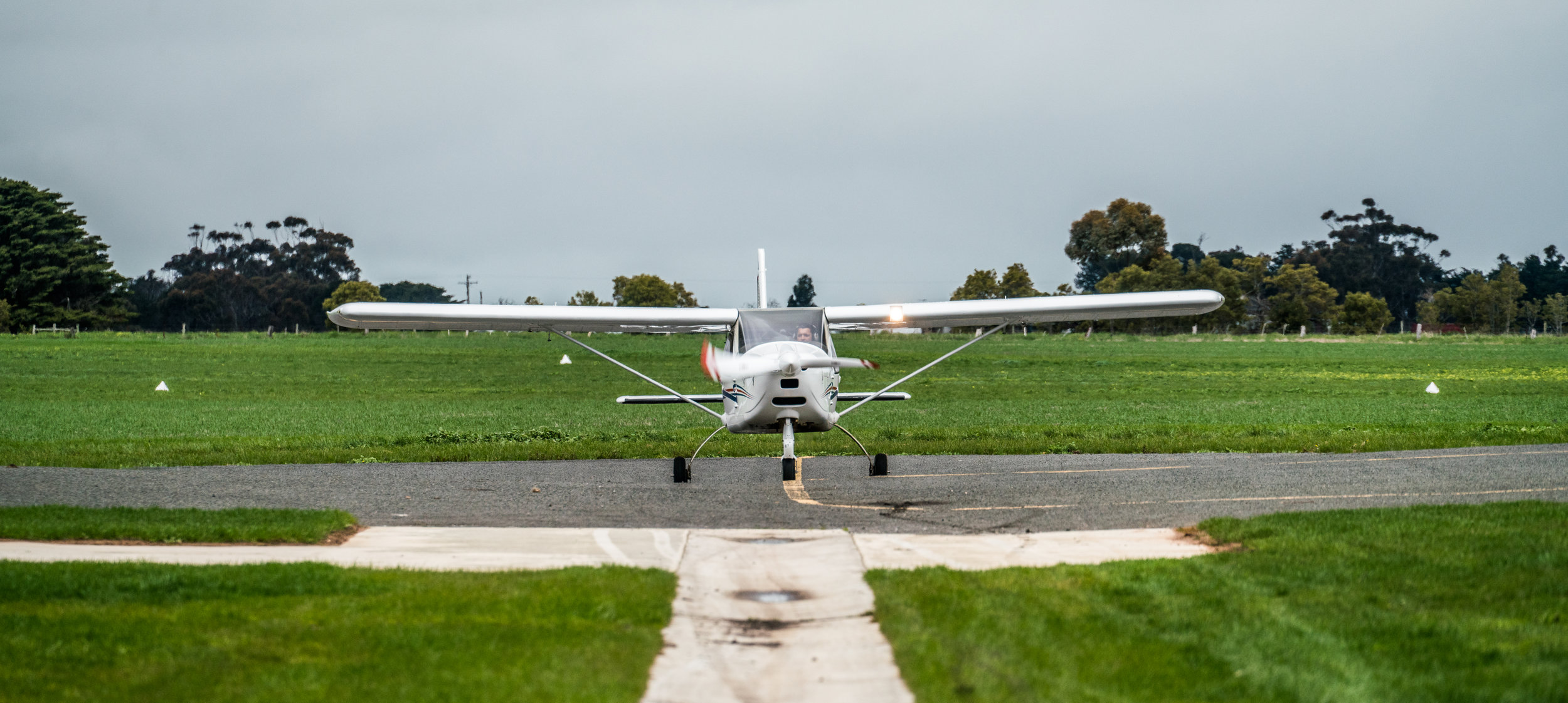 Fineas taxiing the plane after some touch and go landings to familiarize himself with the plane and airport