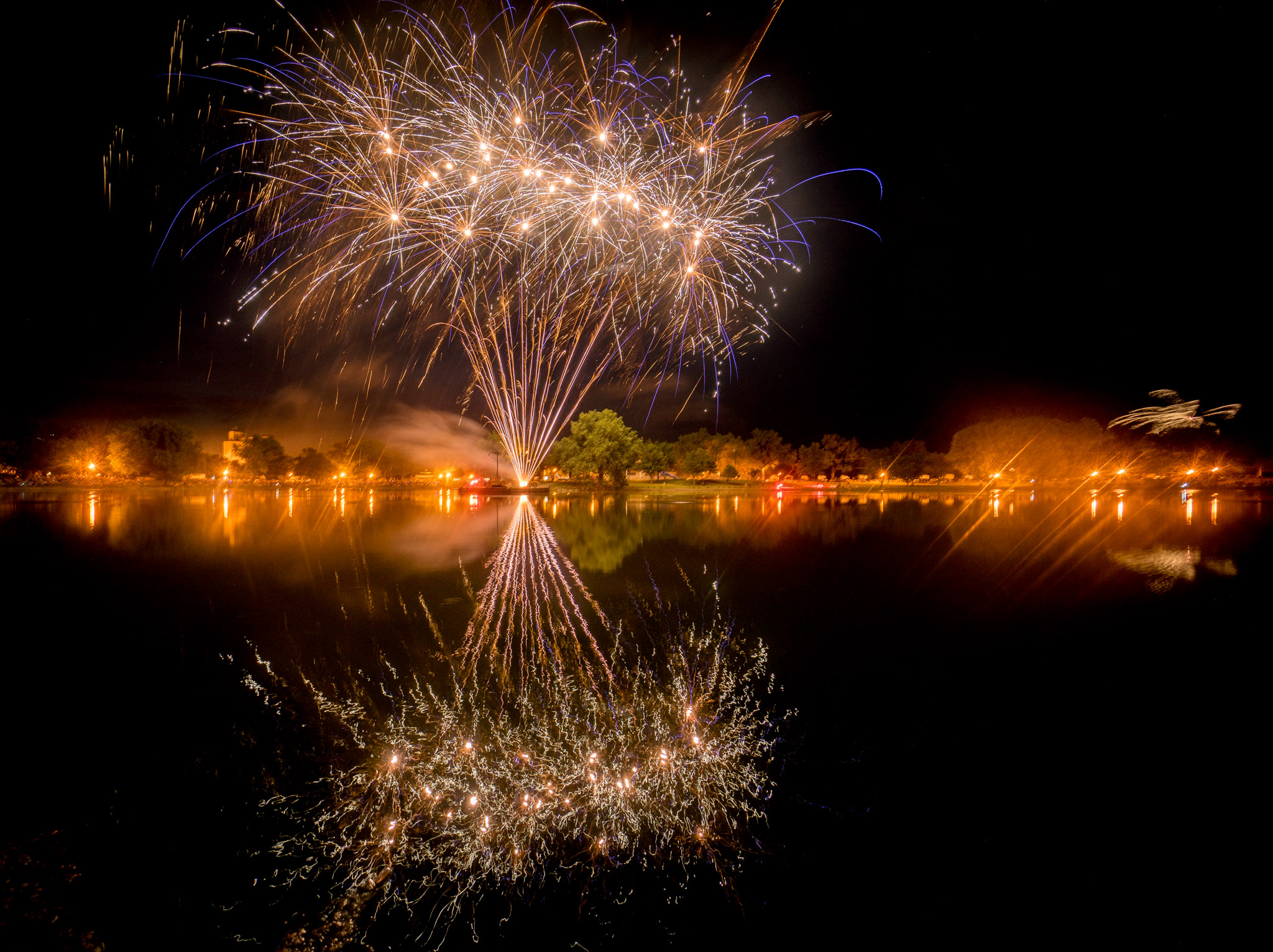 Sony A7r, 10-18mm (APS-C lens in full-frame mode) at 13mm, ISO 100, f/8, 8s. (Sterling, KS - July 4, 2015.)