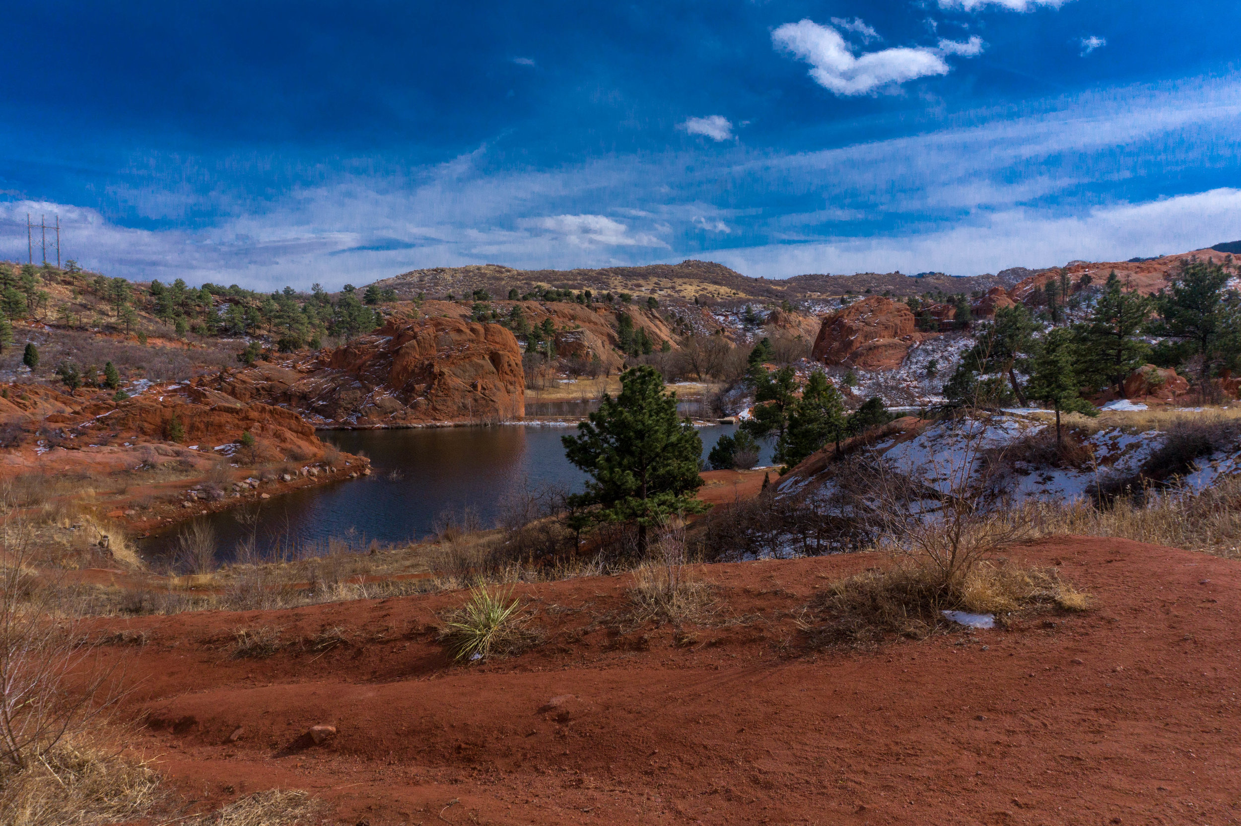 RedRocksOpenSpacepondandrockfromafar.jpg