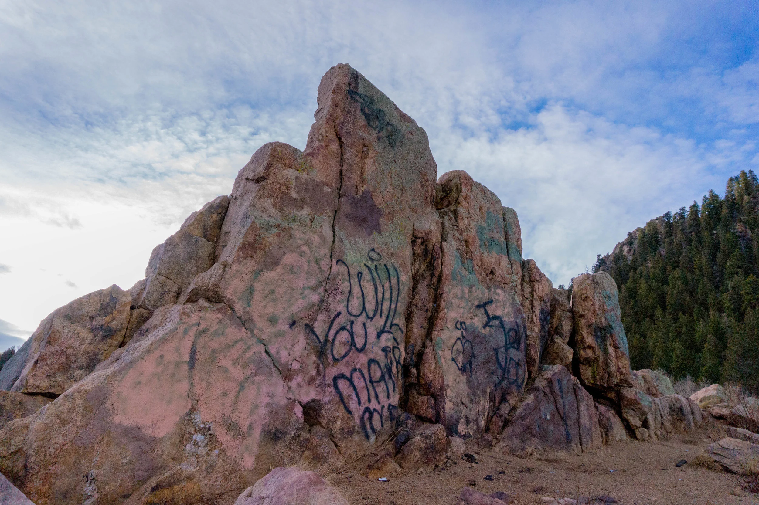 Graffiti on the rock at the top of Gold Camp.jpg