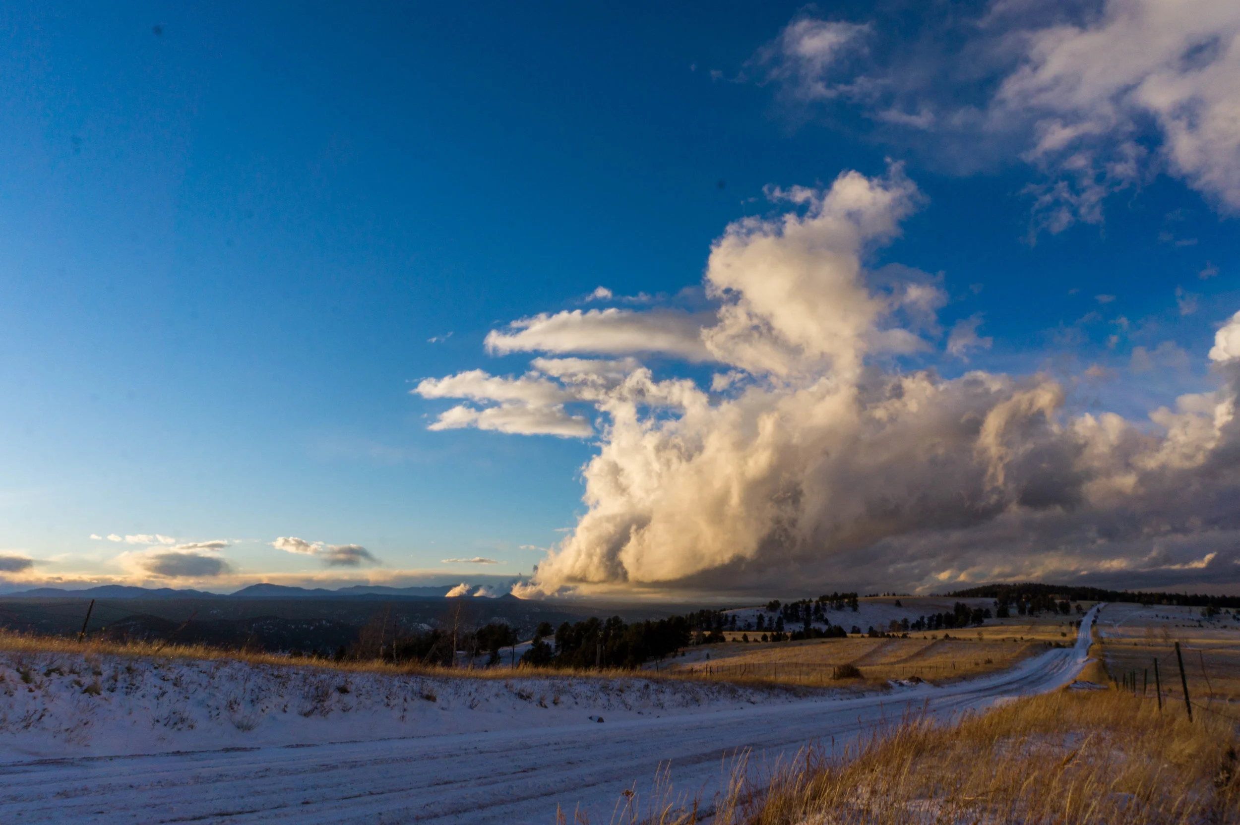 Rampart Range Sunset into Clouds Road.jpg
