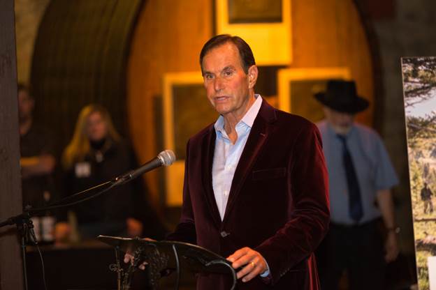 Andy Beckstoffer opens Sunday’s event by discussing the historic relationship between Lake and Napa counties. Photo: Nathan DeHart