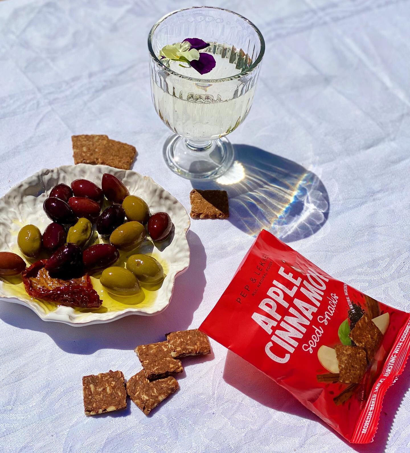 SIP, SIP, HOORAY 😉 🍷 
.
Friday means one thing&hellip; A glass of vino in the sunshine with a selection of delicious snacks (including our revamped seed snacks, of course! 😉)

Our seed snacks are now even more delicious! The simple substitution of