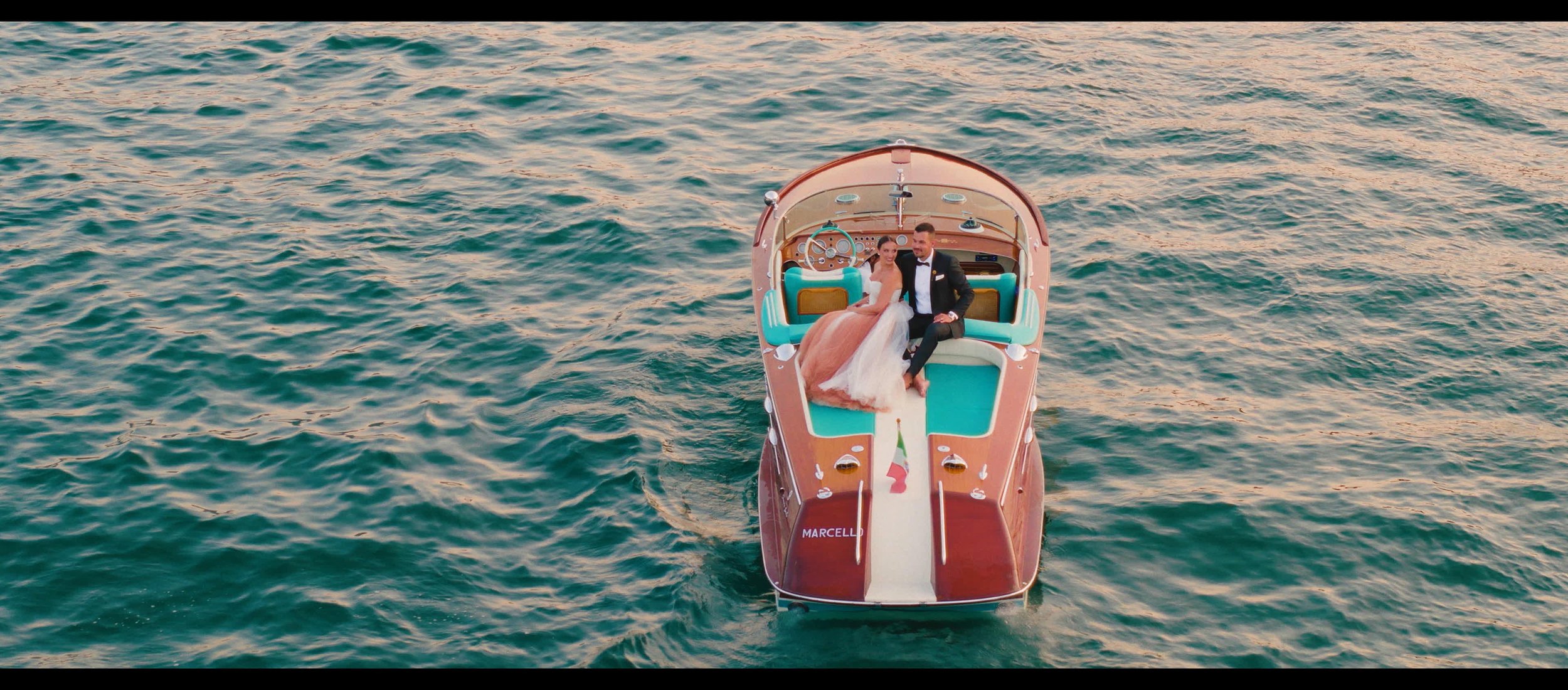 luxury wedding cinematography at lake como , boat tour