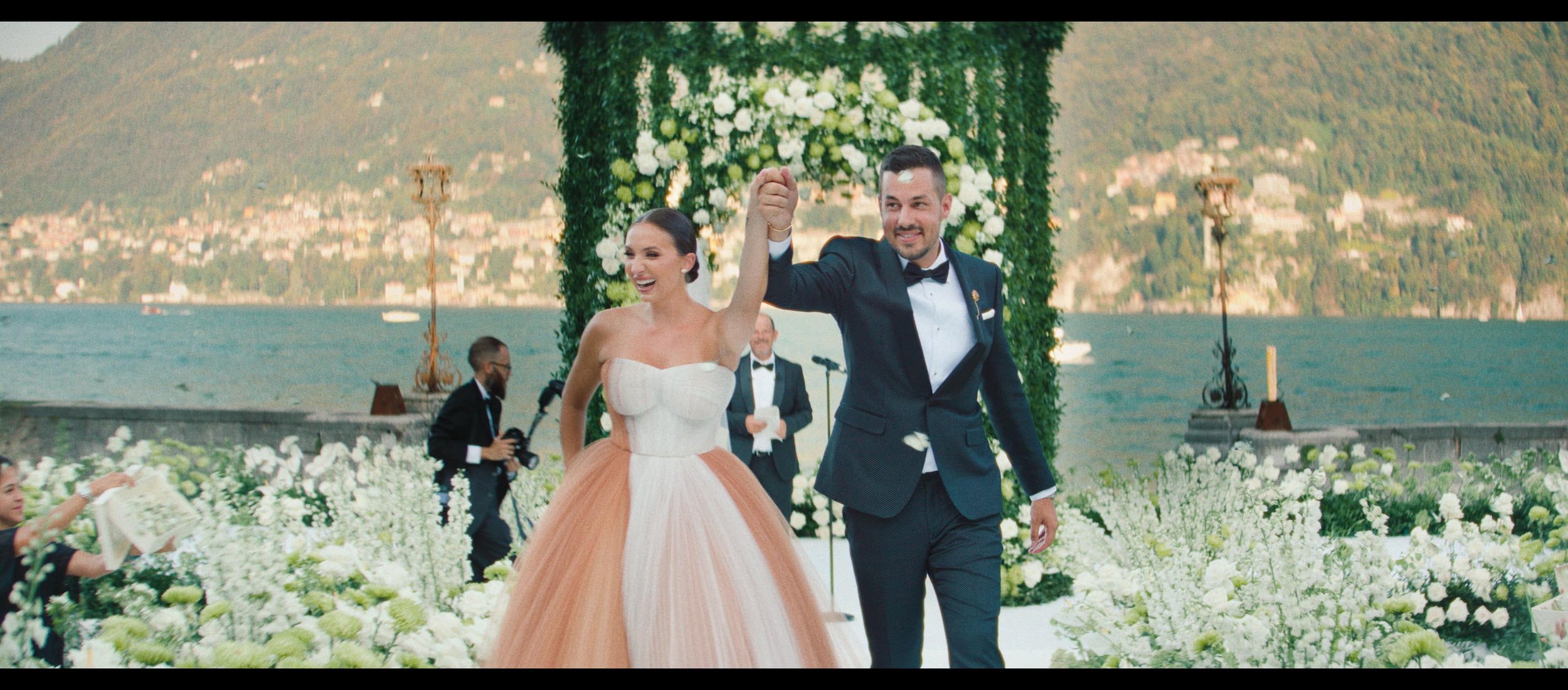 Luxury wedding ceremony exit celebrations at villa erba lake como with Alejandra Poupel and Sacks Productions