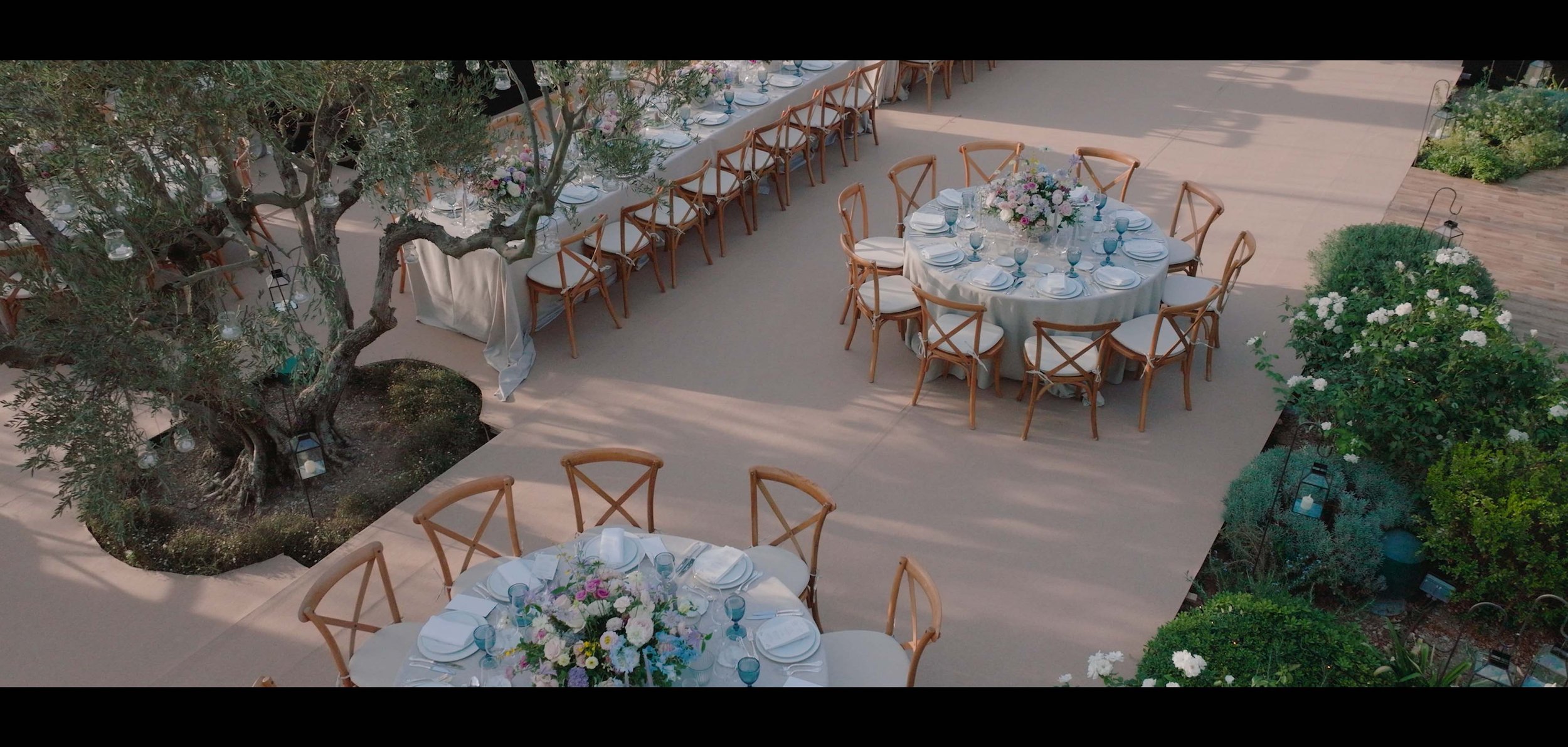 drone, luxury wedding chateau d'estoublon, wedding filmmaker, videography , lavender and rose wedding planner, wedding floral decor