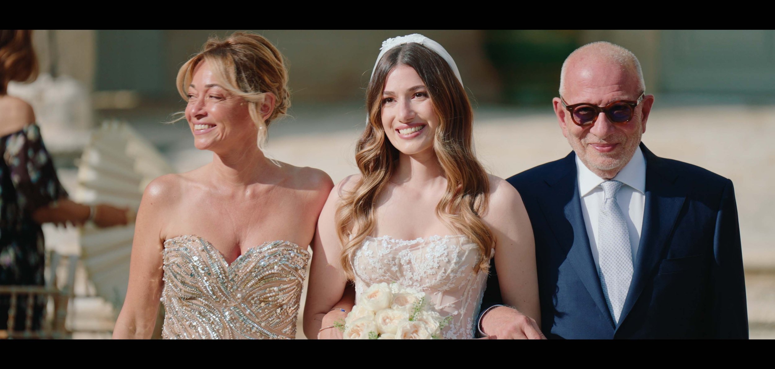 luxury wedding chateau d'estoublon, ceremony entrance , wedding filmmaker, videography , lavender and rose wedding planner