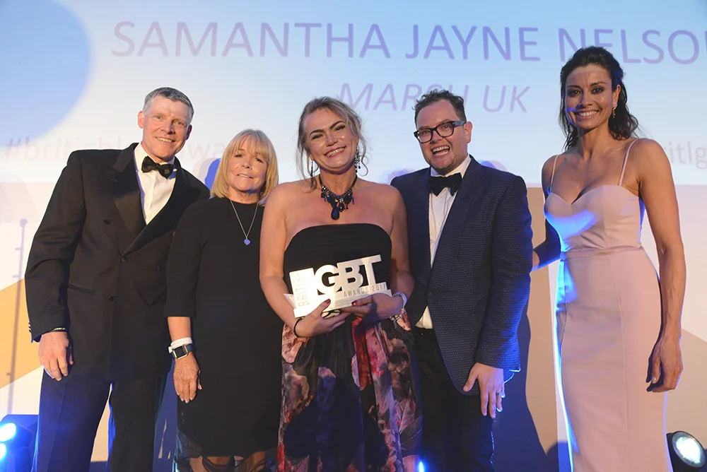 Sam collects her award from category sponsor, vodafone