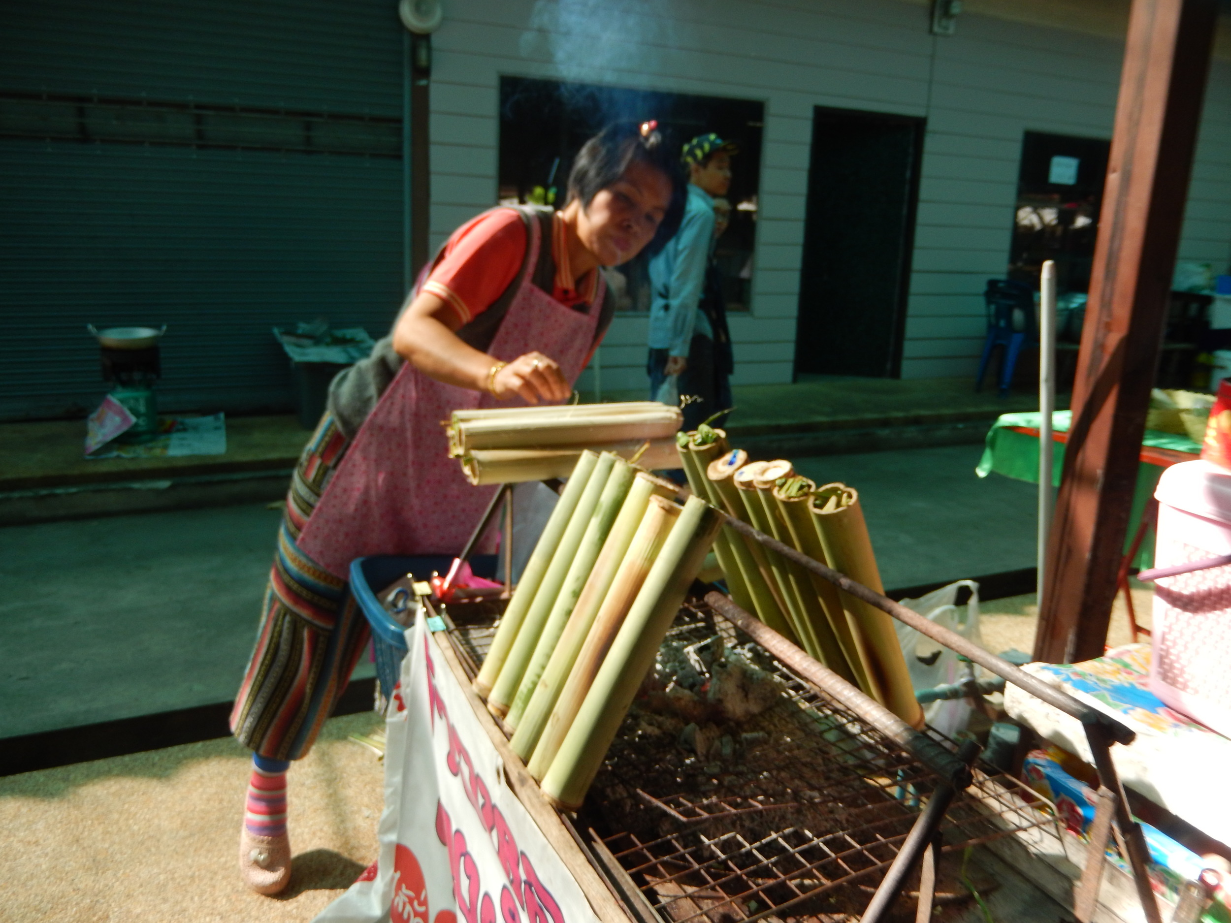 Chaing Mai organic market....sticky rice cooked in sugar cane!