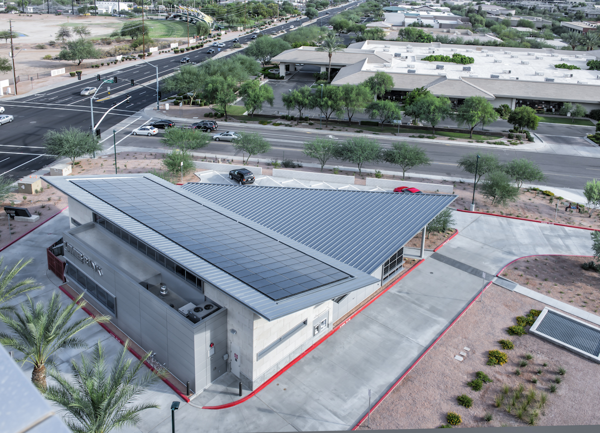 Building and solar panels are oriented to maximize solar productivity.