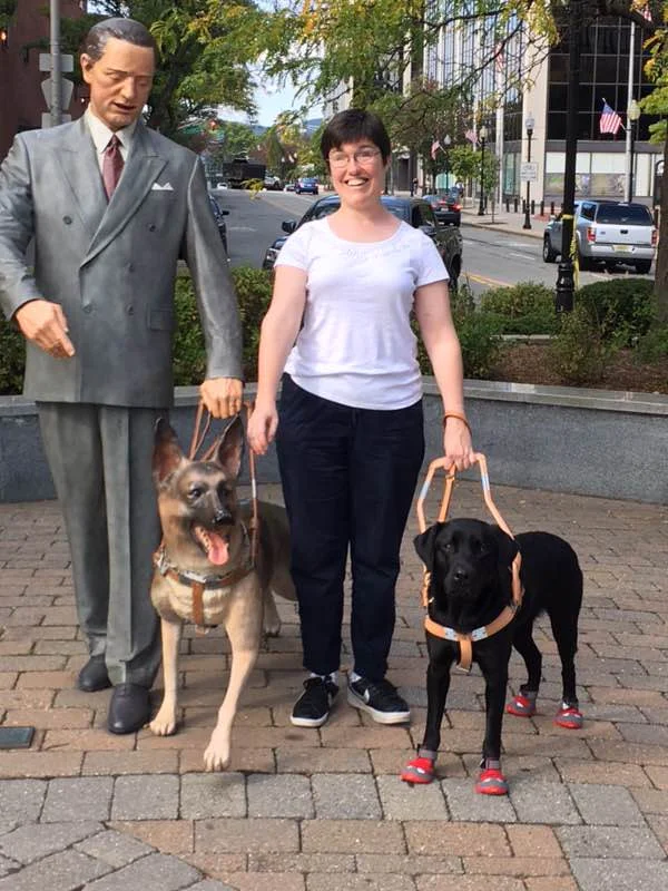 Jamey and her dog Russell (the one with the cute red doggy shoes).