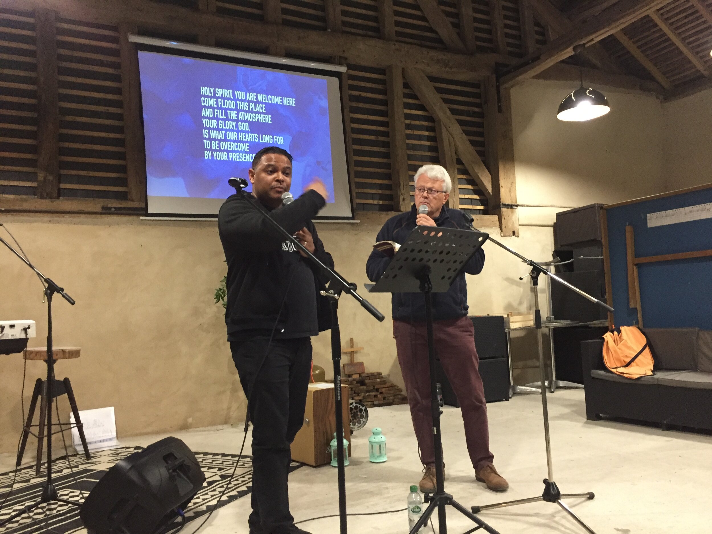 Jonathan Manou preaching with Gary Wright translating