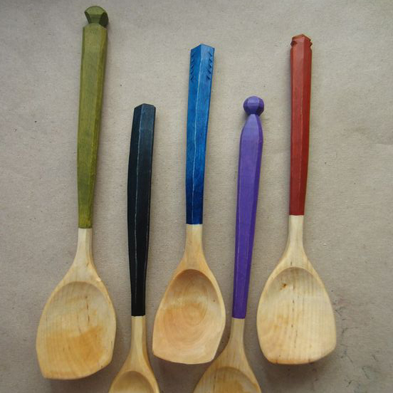Colourfully painted spoons made by Anja Sundberg
