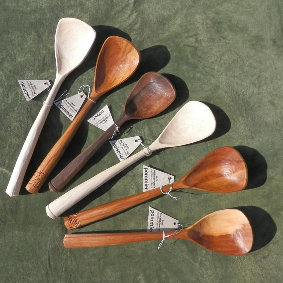 Eating spoons carved from a variety of woods by Jane Mickelborough