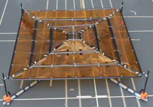 Deployment Dynamics of Thin Shell Space Structures