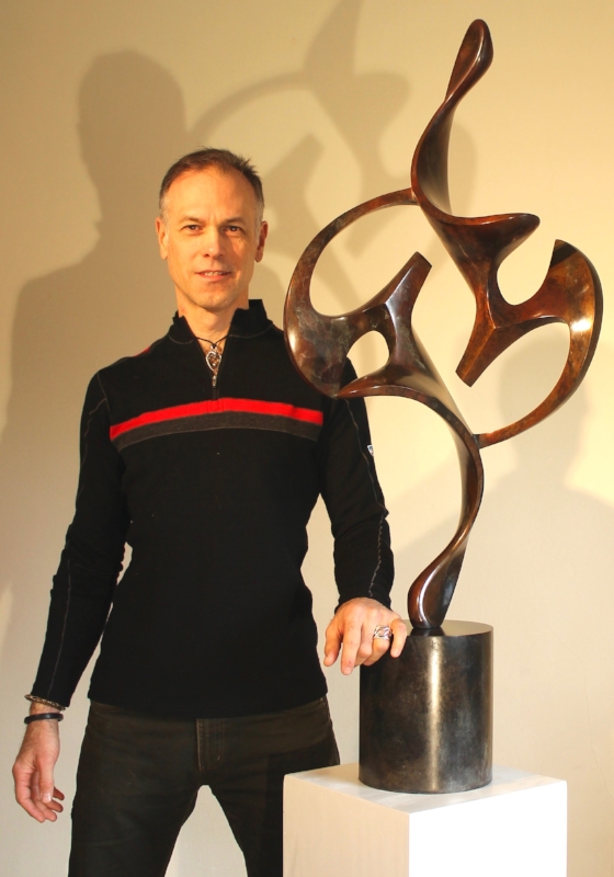 Sculptor Dave Stevenson inside his Chelsea studio with commissioned bronze, Acrobat