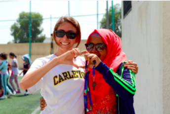 Maddie Ulanow , US director of Reclaim Childhood (left) with Coach Rahaf (Zarqa) (right)