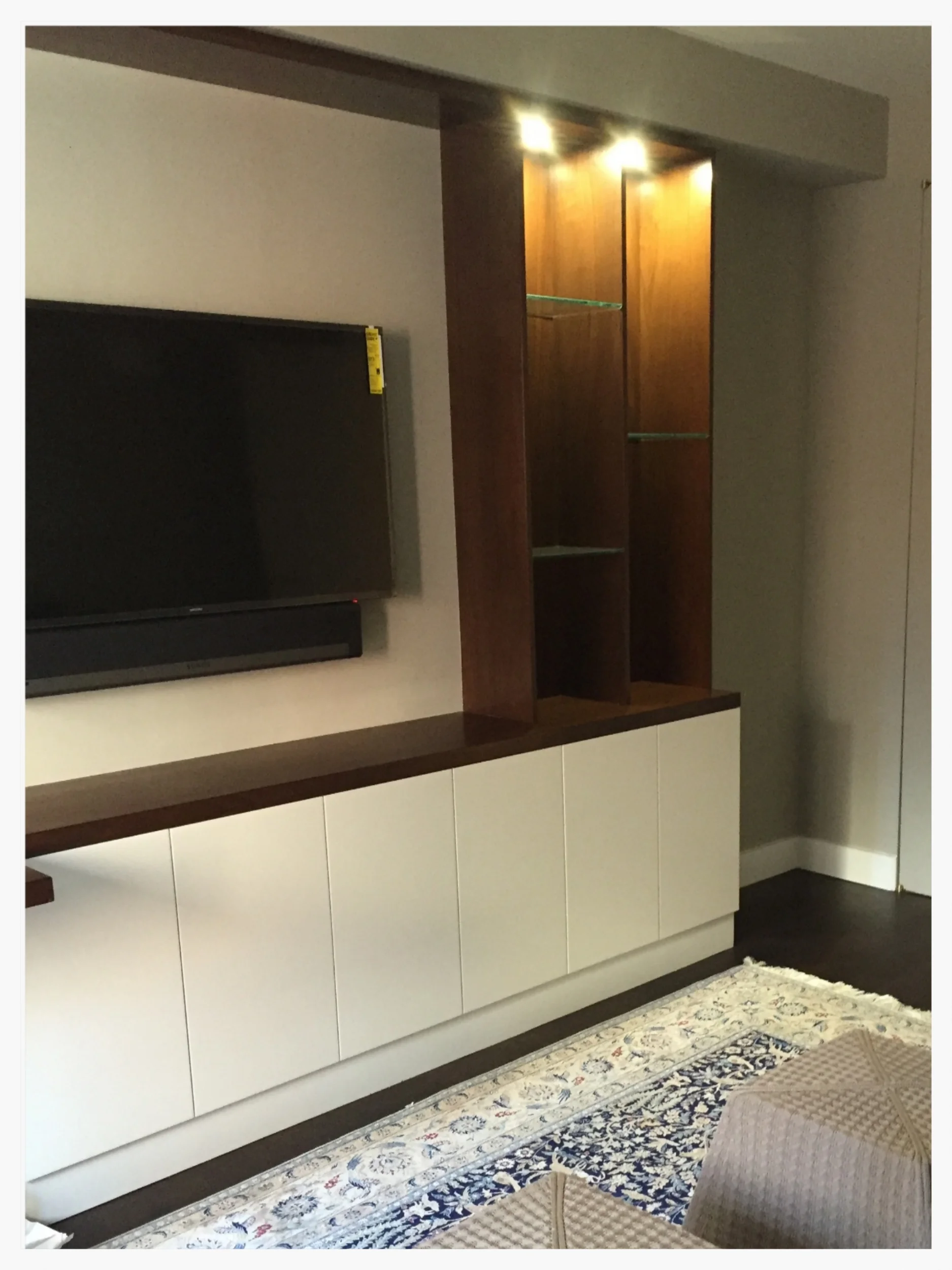 Custom Millwork mixing walnut with cream lacquer