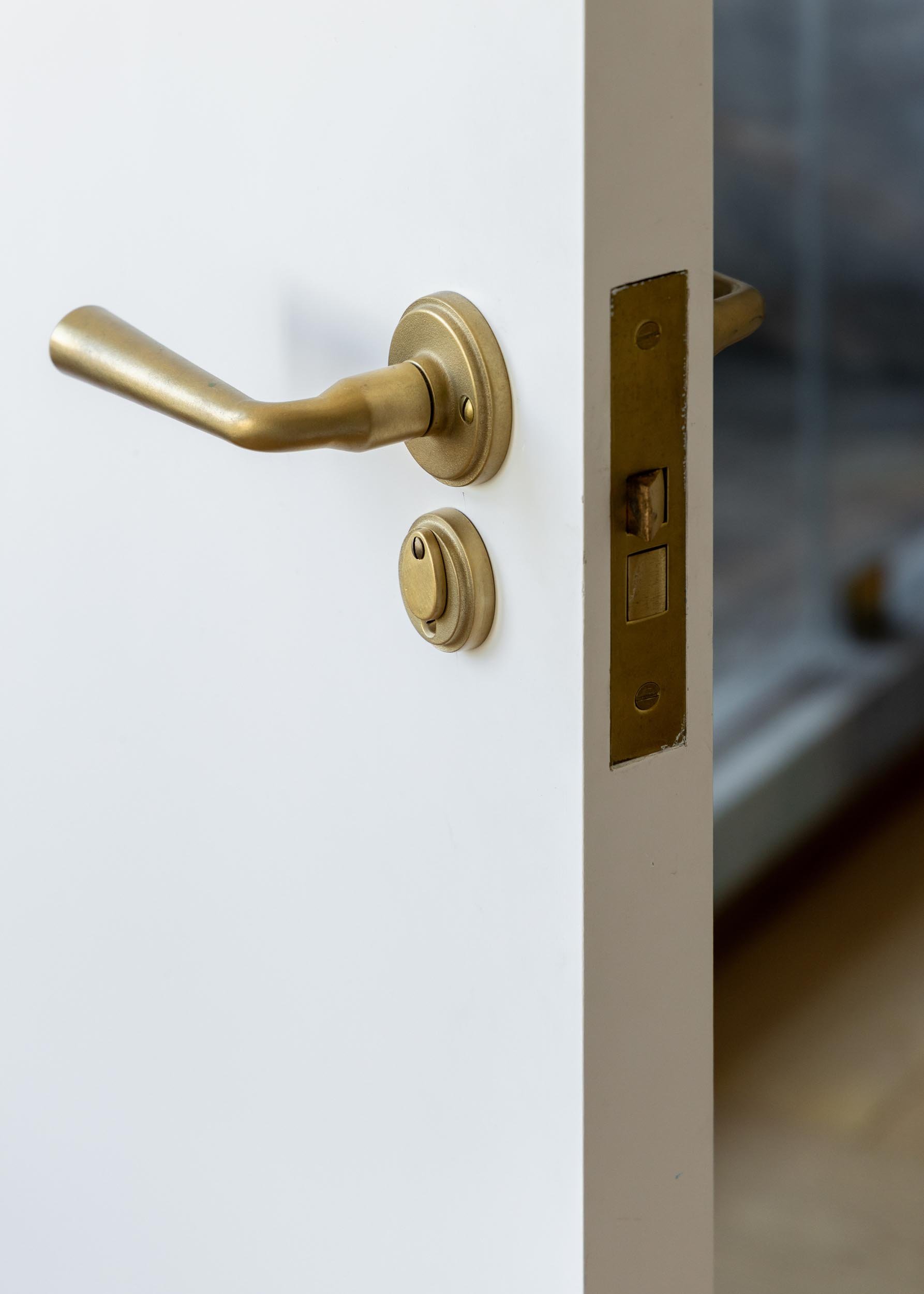   Project // East Village Apt   Door Lever set with Key Cover from Sun Valley Bronze Photography // Jordi Biosca 